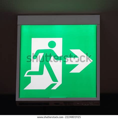 Glowing Green Emergency Exit Signs Indoors Stock Photo 2224801925 | Shutterstock