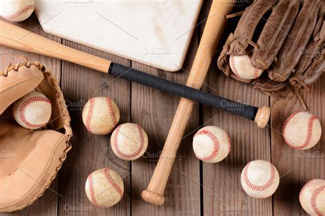 Baseball Gear On Rustic Wood Surface High Quality Sports Stock Photos