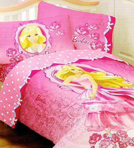 A Pink Bed Set With Princesses On It