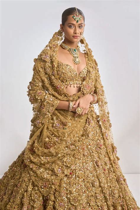 Buy Gold Net Embroidered Floral Sweetheart Metallic Bridal Lehenga Set