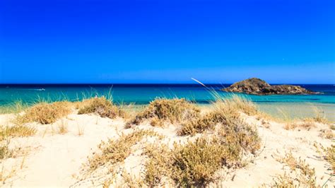 Spiaggia Su Giudeu Foto Come Arrivare E Hotel Nei Dintorni