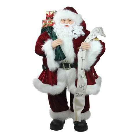 Red And White Standing Santa Claus Holding A Naughty And Nice List