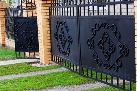 Decorative black gate with brick column — Stock Photo © Aynur_sib #108319626