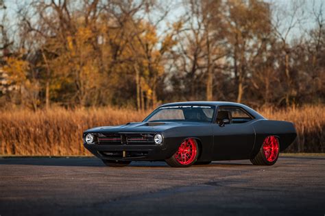 Mafia's Ride: Custom Black Plymouth Barracuda on Candy Red Buttoms — CARiD.com Gallery