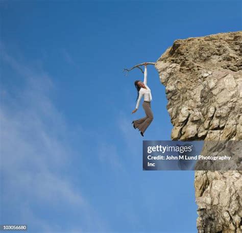 4132 Hanging From Cliff Stock Photos High Res Pictures And Images