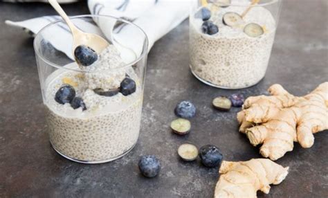 Two Glasses Filled With Oatmeal And Blueberries