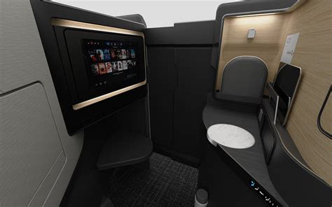 American Airlines unveils images of new business-class suites ...