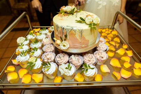 Premium Photo White Wedding Cake Decorated By Flowers Fruits