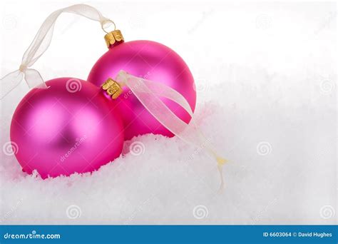 Christmas baubles on snow stock photo. Image of bauble - 6603064