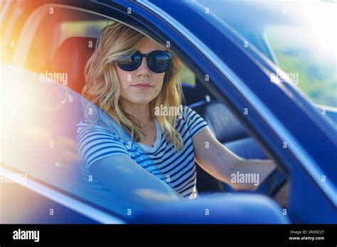 Beautiful Blonde Woman Driving A Car Stock Photo Alamy