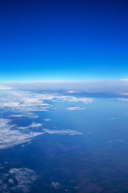 Premium Photo Clouds A View From Airplane Window