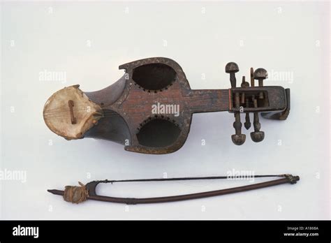 Stringed musical instrument and bow the Sarina or Suroze in Pakistan ...