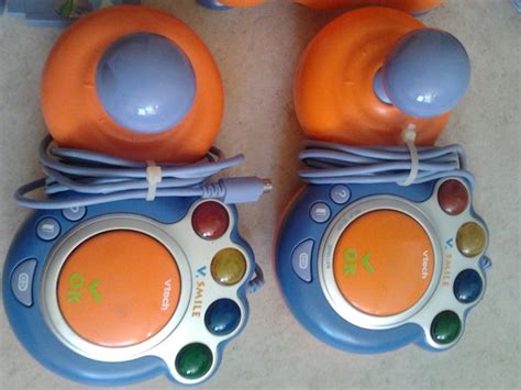 Vtech V.smile console with 11 games and 2 controllers - Catawiki