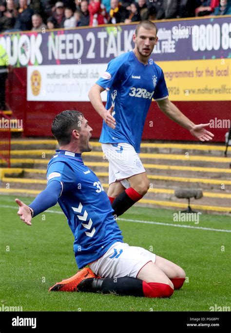 Rangers kyle lafferty celebrates with his team mates hi-res stock ...