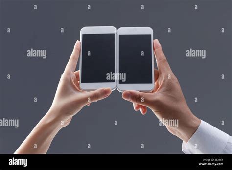 Hand Holding Mobile Phone Stock Photo Alamy