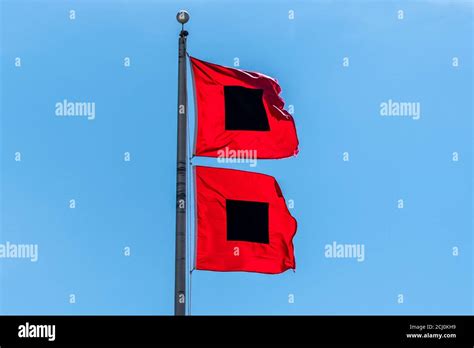 Hurricane warning flag hi-res stock photography and images - Alamy