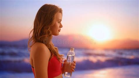 Female Model On The Beach At Sunset Young Athletic Woman In Sportswear