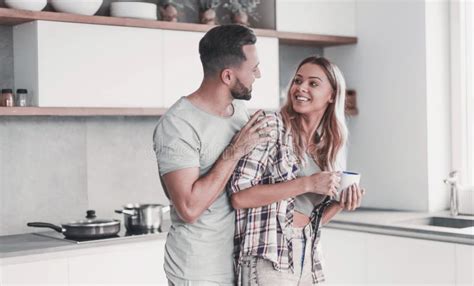 Cheerful Couple In The Kitchen On A Good Morning Stock Image Image Of Beautiful House 160657251