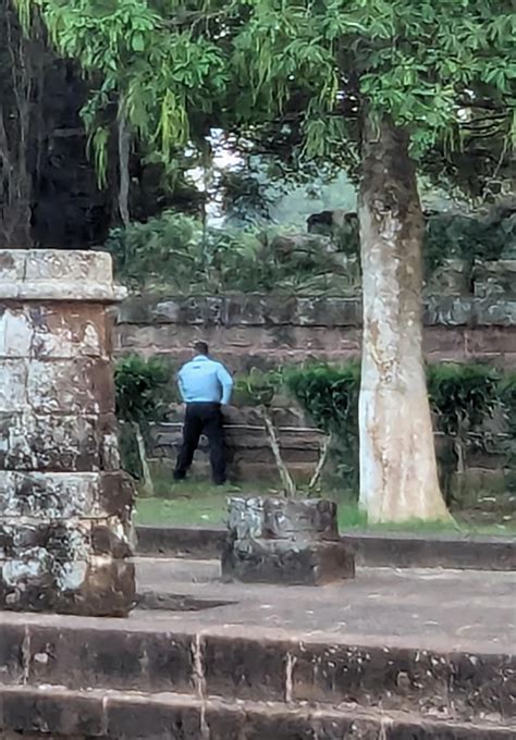 security guard peeing  konark temple wall rindia