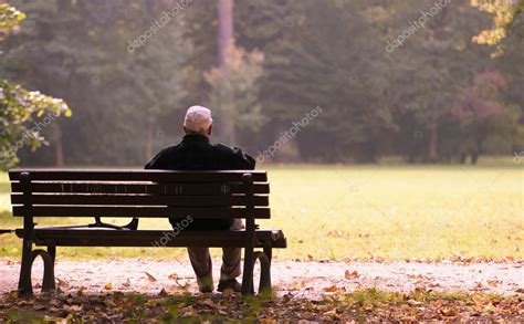 Old Man Sitting On A Bench