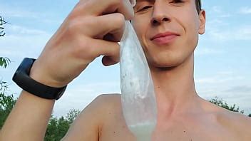 Twink Boy Found Again A Filled Up Condom While Nude Beach Cruising So He Put His Dick In It