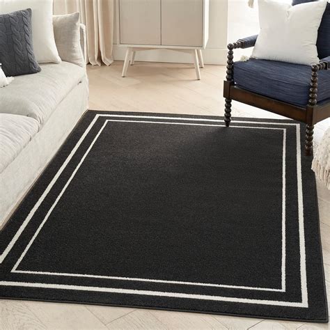 Nourison Essentials Indoor Outdoor Solid Bordered Black Ivory 5 X 7 Area Rug Easy