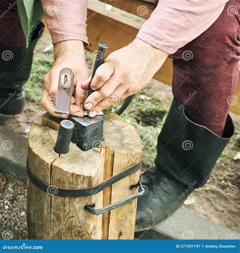 Production of Medieval Coins by Casting and Forging. Reconstruction O
