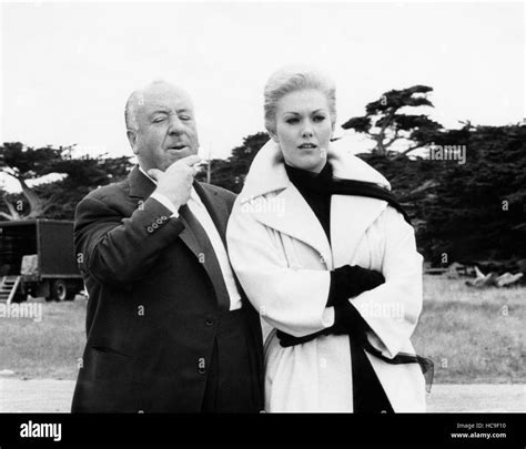 VERTIGO, director Alfred Hitchcock, Kim Novak, between scenes, 1958 ...