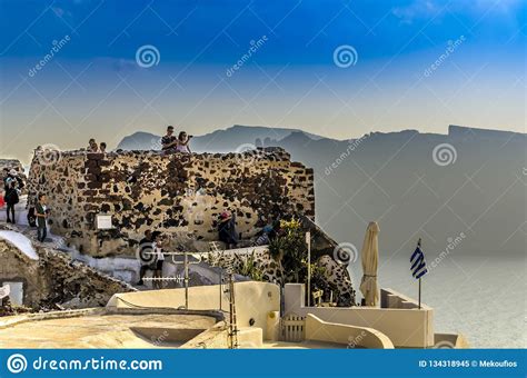 SANTORINI, GREECE - October 9, 2014: Sunset in the Village of Oia ...