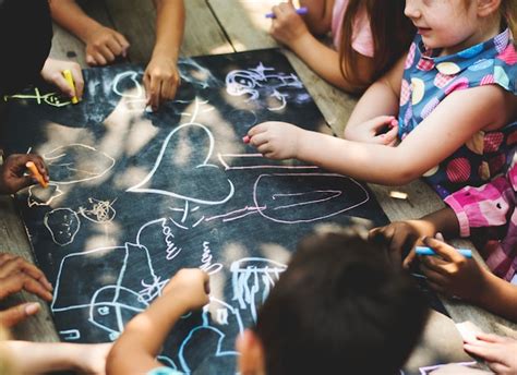 Premium Photo | Diverse group of children drawing