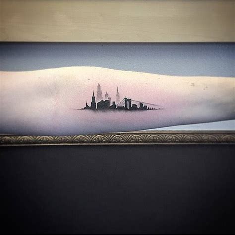 Single Needle New York Skyline Tattoo On The Left Inner