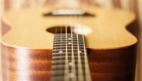 The Right Way To Hold A Guitar For Beginners Mozart Project