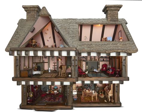 A Unique Robert Stubbs Wood And Composition Tudor Style Dolls House