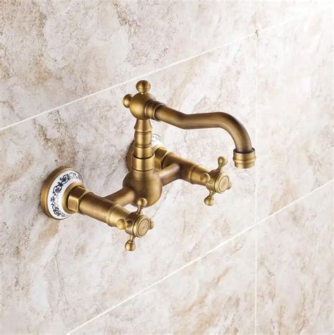 Free Shipping Classic Wall Mount Bathroom Hot And Cold Water Tap Antique Brass Dual Handle