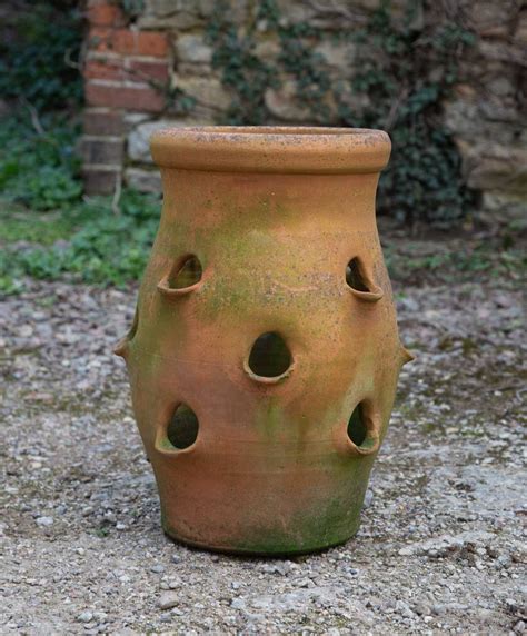 Lot 1157 - A terracotta strawberry planter