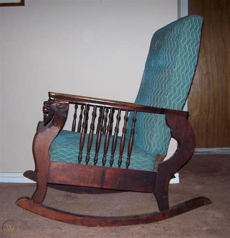 Simple Antique Rocking Chair With Lion Heads Dutailier Nursing Cushions