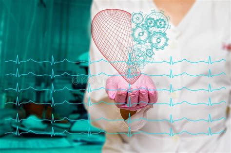 Concept Of Health And Medicine Female Doctor Holding A Red Heart With