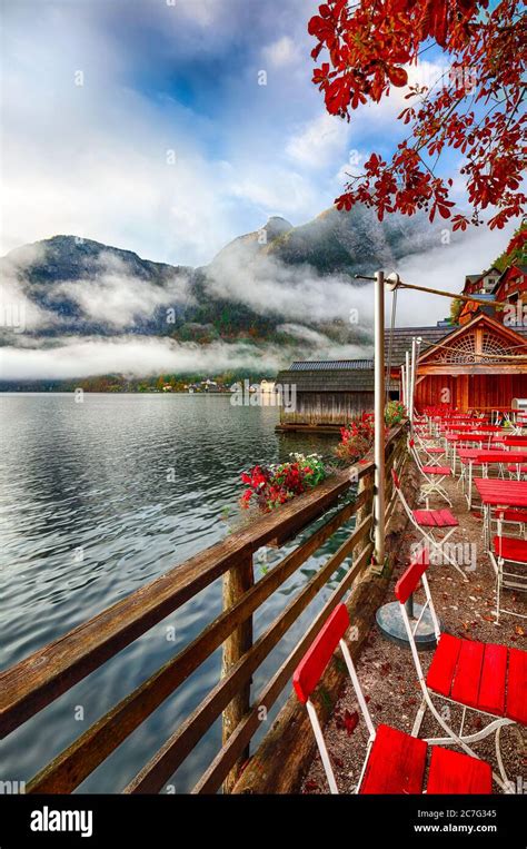 Scenic view of famous Hallstatter lake. Foggy autumn sunrise at Small chinese restaurant near ...