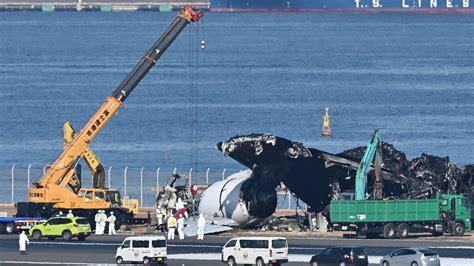 Collision At Tokyo Haneda Airport Evacuation Of Airbus Wreckage Begins