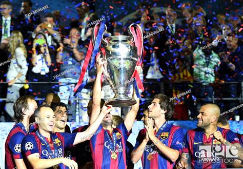 Barcelona's team celebrates with the trophy after the UEFA Champions ...