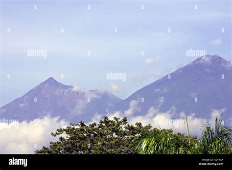 GUATEMALA ANTIGUA Volcanoes Fuego left and Acatenango right near the ...