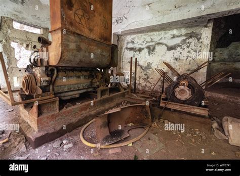 Old Abandoned Industrial Machine Tools And Rusty Metal Equipment In