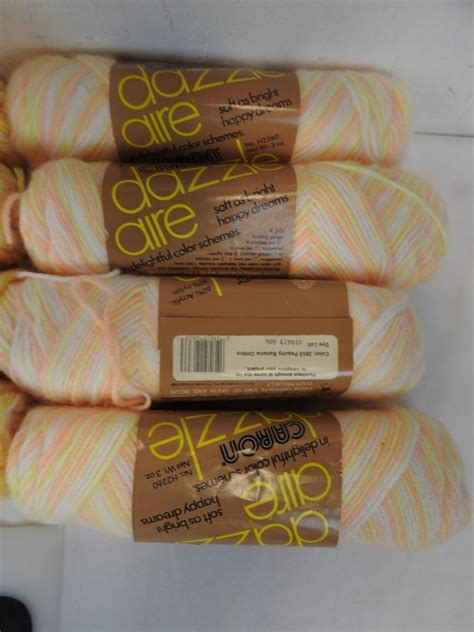 Skeins Of Yarn Banana And Peach Colored Caron Dazzle Aire