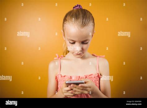 Blonde Girl Using Her Smartphone Stock Photo Alamy