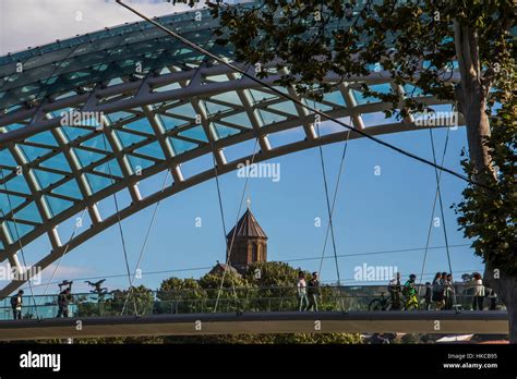 Bridge Of Peace A Bow Shaped Pedestrian Bridge Over The Mtkvari Kura River And Metekhi Church