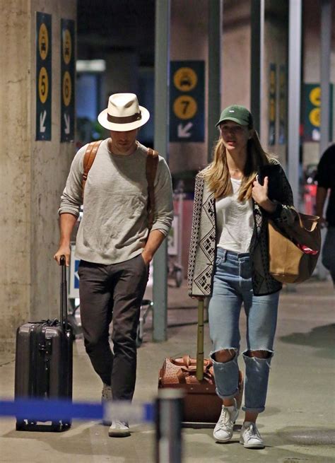 Melissa Benoist and Chris Wood Arrives in Vancouver -08 | GotCeleb