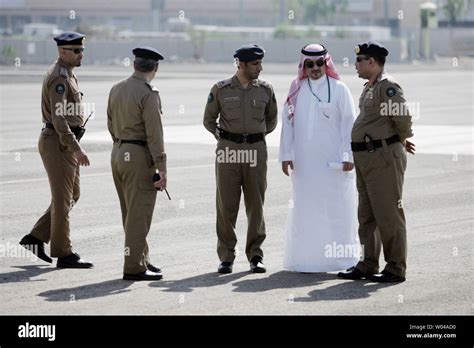 Saudi security officers talk together in Mina valley,near Mecca, Saudi ...