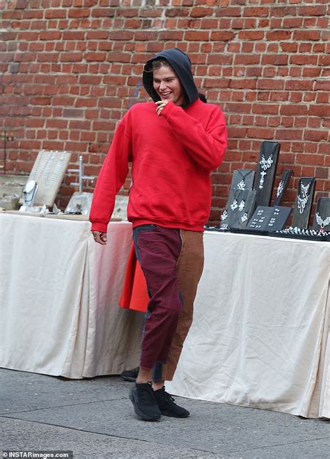 Jordan Barrett Looks Dishevelled In An Oversized Red Jumper And Tri