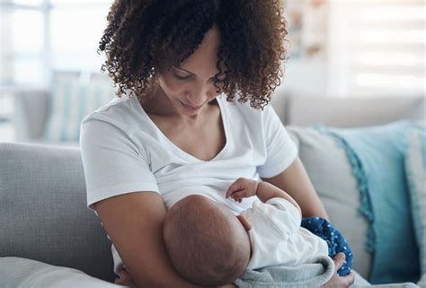 mother feed baby