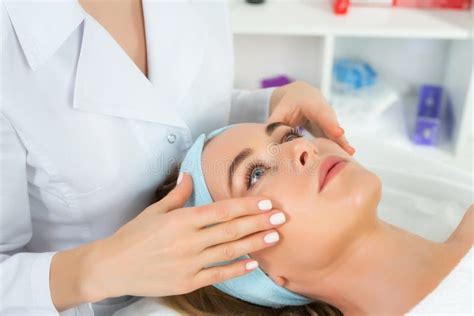 Female Beautician Doctor With Patient In Wellness Center Professional